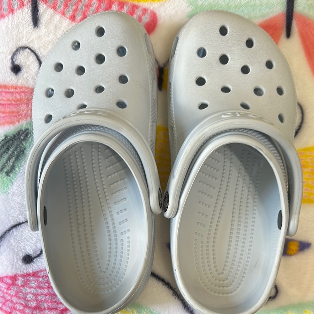 Women’s Classic Crocs light blue 
These have been worn. Please see pictures.